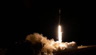 In this image released by NASA, a SpaceX Falcon 9 rocket with NASA's Surface Water and Ocean Topography (SWOT) satellite lifts off from Vandenberg Air Force Base, in Santa Barbara, California, on December 16, 2022. (Photo by Keegan Barber / NASA / AFP)