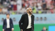 Morocco's coach Walid Regragui reacts from the sidelines during the Qatar 2022 World Cup third place play-off football match between Croatia and Morocco at Khalifa International Stadium in Doha on December 17, 2022. (Photo by KARIM JAAFAR / AFP)