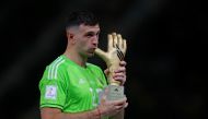 Argentina's Emiliano Martinez after he is awarded the golden glove award during the trophy ceremony of the FIFA World Cup Qatar 2022 at the Lusail Stadium, Lusail, Qatar, on December 18, 2022. REUTERS/Hannah Mckay