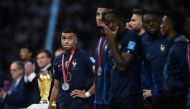 December 18, 2022 France's Kylian Mbappe reacts after receiving the runners up medal and the Golden Boot award REUTERS/Dylan Martinez