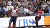 Kenya's Mark Otieno Odhiambo (right) and Jonathan Quarcoo of Norway in action during the men's 200 metres heats of the 2017 World Athletics Championships in London on August 7, 2017.  File Photo / Reutes