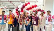 Starlink staff celebrating Qatar National Day at its Lusail office.