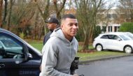 France's forward Kylian Mbappe entering the PSG training ground in Paris on Wednesday. Source: Twitter/@PSG_English
 