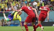 Richarlison (left) scores his second goal during the match between Brazil and Serbia at the Lusail Stadium. AFP