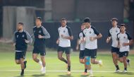 Al Sadd players attend a training session.