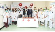 Hamad Medical Corporation staff members marking the World Pressure Injury Prevention Day.