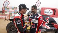 Toyota Gazoo Racing's Nasser Al Attiyah and co-driver Mathiu Baumel after the seventh stage, yesterday. REUTERS