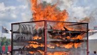 File Photo: Seized Rhino horns are seen burning during an event to mark World Rhino Day in Bokakhat near Kaziranga National Park in the northeastern state of Assam, India, September 22, 2021. (REUTERS/Anuwar)