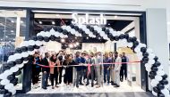 Nitin Grover, DGM – Finance, Landmark Group Qatar, and Rajgopal – Sr. Marketing Manager, Landmark Group Qatar, with the Splash team during the inauguration of Splash Abu Sidra Mall.