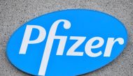 In this file photo taken on December 22, 2020 in Puurs, Begium, the logo of US multinational pharmaceutical company Pfizer at the production site of the Covid-19 vaccine that was given the European Union's green light the day before, paving the way for vaccinations to finally start in the 27-nation block. (Photo by JOHN THYS / AFP)