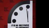 The clock with the Bulletin of the Atomic Scientists is placed ahead of the announcement of the location of the minute hand on its Doomsday Clock, indicating what world developments mean for the perceived likelihood of nuclear catastrophe, at the National Press Club in Washington, US, January 24, 2023. REUTERS/Leah Millis
