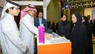 Minister of Education and Higher Education H E Buthaina bint Ali Al Jabr Al Nuaimi touring a pavilion of Qatar Spotlight winning projects.