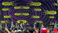 This picture taken on January 6, 2023 shows members of the all-female hijab-clad Nasida Ria band performing on stage in front of an audience at a festival in Jakarta. (Photo by AGNES ANYA / AFP)