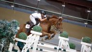 Salmeen Sultan Al Suwaidi guides Fiori LS over a fence during the Medium Tour team event.