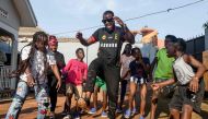 Members of Ghetto Kids, a prominent dance group in Uganda rehearse a dance routine at Big Talent Entertainment studio during a music video dance rehearsal with Ugandan musician Edrisah Musuuza, also known as Eddy Kenzo (C), in Makindye, a suburb in Kampala, Uganda, on January 20, 2023. Photo by BADRU KATUMBA / AFP