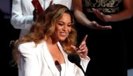 Beyonce reacts after winning the entertainer of the year award at the 50th NAACP Image Awards in Los Angeles, California, US, March 30, 2019. (REUTERS/Mario Anzuoni)