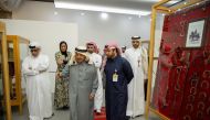 H E Sheikh Faisal bin Qassim Al Thani, Katara General Manager, Prof. Dr. Khalid bin Ibrahim Al Sulaiti, Katara Director of Cultural Affairs & Events, Khalid Al Sayed along with other officials visiting the Collectibles exhibition. 