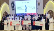 Winners of Al Fikra competition with officials during the ceremony.