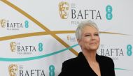 US actress Jamie Lee Curtis poses on the red carpet upon arrival at the BAFTA British Academy Film Awards at the Royal Festival Hall, Southbank Centrer, in London, on February 19, 2023. (Photo by ISABEL INFANTES / AFP)