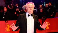 French director Nicolas Philibert poses on the red carpet as he arrives to attend the award ceremony of the 73rd Berlin International Film Festival in Berlin, on February 25, 2023. (Photo by Tobias SCHWARZ / AFP)