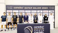 Players and officials pose for a group picture after the draw ceremony.