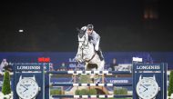 German rider Ludger Beerbaum guides Mila over a fence during the Longines Global Champions Tour Grand Prix of Doha 2022 in this file photo.