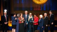 Honoree Canadian singer-songwriter Joni Mitchell speaks onstage during the Library of Congress Gershwin Prize for Popular Song ceremony in Washington, DC, March 1, 2023. - Also pictured are Senator Susan Collins, a Republican from Maine, Senator Amy Klobuchar, a Democrat from Minnesota, US House Speaker Kevin McCarthy, a Republican from California, Senator Patty Murray, a Democrat from Washington, and Senator Jack Reed, a Democrat from Rhode Island. (Photo by Stefani Reynolds / AFP)