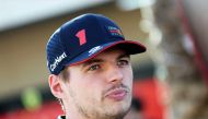 Red Bull Racing's Dutch driver Max Verstappen arrives in the paddock at the Bahrain International Circuit in Sakhir ahead of the Bahrain Formula One Grand Prix on March 2, 2023. (Photo by Giuseppe CACACE / AFP)