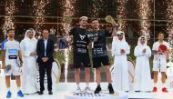 Argentina's Ooredoo Qatar Major champions Franco Stupackzuk and Martin Di Nenno celebrate with the trophies after defeating compatriots Fernando Belasteguin  and Carlos Daniel Gutierrez in the final yesterday. Qatar Tennis, Squash and Badminton Federation (QTSBF) President Nasser Ghanim Al Khelaifi, Ooredoo CEO Sheikh Ali bin Jabor Al Thani, FIP President Luigi Carraro and QTSBF Secretary General Tariq Zainal are also present.