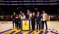 Pau Gasol #16 of the Los Angeles Lakers and family pose for a picture during his jersey retirement ceremony at halftime in the game between the Memphis Grizzlies and the Los Angeles Lakers at Crypto.com Arena on March 07, 2023 in Los Angeles, California. Harry How / AFP
