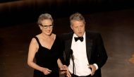 HOLLYWOOD, CALIFORNIA - MARCH 12: (L-R) Andie MacDowell and Hugh Grant speaks onstage during the 95th Annual Academy Awards at Dolby Theatre on March 12, 2023 in Hollywood, California. Kevin Winter/Getty Images/AFP (Photo by KEVIN WINTER / GETTY IMAGES NORTH AMERICA / Getty Images via AFP)