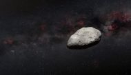 A handout artist's impression released on March 24, 2023 by the European Space Agency (ESA) shows a grey, irregularly-shaped asteroid, rocky objects that often pass safely past Earth. (Photo by Handout / EUROPEAN SPACE AGENCY / AFP) 