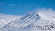 This file photo taken on May 4, 2022 shows a view of mountains near Longyearbyen, located on Spitsbergen island, in Svalbard Archipelago, northern Norway. Photo by Jonathan NACKSTRAND / AFP