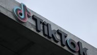 This file photo taken on March 16, 2023 shows the TikTok logo displayed outside the social media app's company offices in Culver City, California. Photo by Patrick T. Fallon / AFP