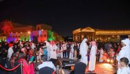 Children and others visit Katara to celebrate Garangao.