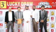 Officials during the announcement of the winner of the mega promotion 'Win 5 Nissan Patrol 2022 Car' by Safari Hypermarket at the Al Khor branch of the hypermarket on Monday.