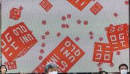  In this file photo taken on January 11, 2023, pedestrians walk in front of a Uniqlo store operated by Japan's Fast Retailing in Tokyo. Photo by Philip FONG / AFP