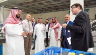 University of Doha for Science and Technology officials with the Saudi Arabian delegation during the visit to the university.