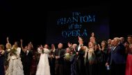 Sarah Brightman, Andrew Lloyd Webber, Cameron Mackintosh and Laird Mackintosh as the Phantom, take a bow at the end of the final performance of the musical “Phantom of the Opera” at the Majestic Theater in New York City on April 16, 2023. Photos by TIMOTHY A. CLARY / AFP