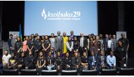 Ambassador of Rwanda to Qatar, H E Igor Marara, with Northwestern Qatar students, faculty, staff and members of the Education City community during the event.