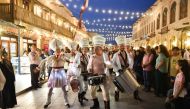 Crowd witnessing street performers during Souq Waqif Eid Festival yesterday. PIC: Abdul Basit