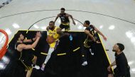 LeBron James #6 of the Los Angeles Lakers drives on Andrew Wiggins #22, Klay Thompson #11, Jordan Poole #3, and Stephen Curry #30 of the Golden State Warriors in game one of the Western Conference Semifinal Playoffs at Chase Center on May 02, 2023 in San Francisco, California.Photo by EZRA SHAW / Getty Images via AFP
