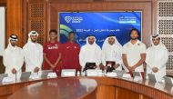 Qatar Athletics Federation (QAF) President and Chairman of Doha Diamond League Organising Committee Mohammed Issa Al Fadala poses for a photograph with other QAF officials and Qatar athletes following a press conference held at the Qatar Olympic Committee Headquarters, yesterday. Pic: Abdul Basit