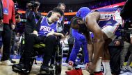 James Harden #1 of the Philadelphia 76ers gives his game sneakers to Michigan State shooting survivor John Hao after defeating the Boston Celtics in game four of the Eastern Conference Second Round Playoffs at Wells Fargo Center on May 07, 2023 in Philadelphia, Pennsylvania. (Photo by Tim Nwachukwu / GETTY IMAGES NORTH AMERICA / Getty Images via AFP)
