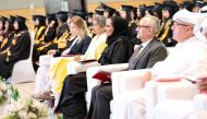 Qatar Museums Chairperson H E Sheikha Al Mayassa bint Hamad bin Khalifa Al Thani (third right) and other dignitaries and faculty attending VCUarts Qatar commencement ceremony 2023.