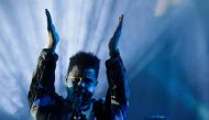  The Weeknd play at the end of the H&M STUDIO SS17 Spring-Summer 2017. (Photo by GEOFFROY VAN DER HASSELT / AFP)
 