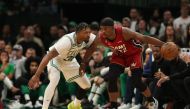 Jimmy Butler #22 of the Miami Heat is guarded by Marcus Smart #36 of the Boston Celtics during the fourth quarter in game two of the Eastern Conference Finals at TD Garden on May 19, 2023 in Boston, Massachusetts.  Adam Glanzman / AFP
