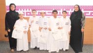 The winning schoolchildren with officials at the concluding ceremony. 