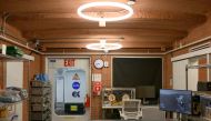 The workroom inside of CHAPEA's Mars Dune Alpha at the Johnson Space center in Houston, Texas on April 11, 2023. (Photo by Mark Felix / AFP)