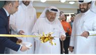 Sheikh Faisal bin Qassim Al Thani (second right) during the ribbon-cutting ceremony.